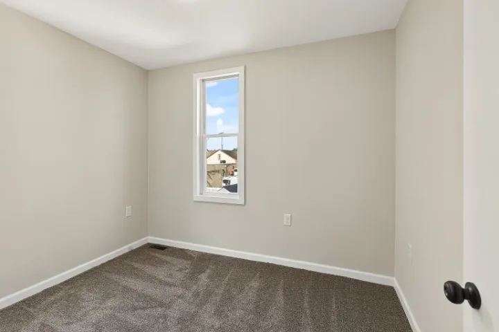 Bedroom with tall window