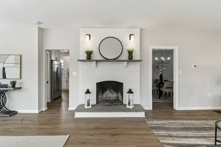 Painted-brick fireplace with stone hearth